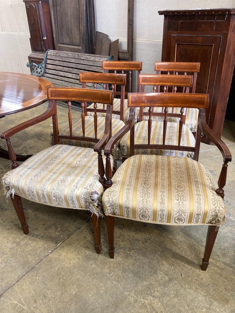 A set of six Sheraton style mahogany dining chairs